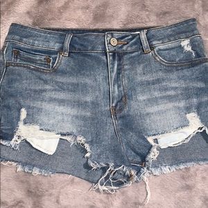 Medium wash high rise distressed shorts!